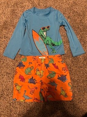 okie dokie Blue Rash Guard with Orange Dino Swim Trunks